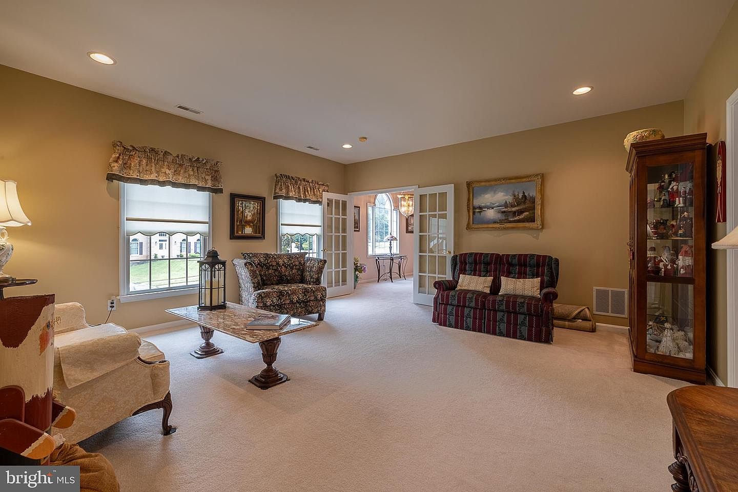 Primary suite sitting room with French doors