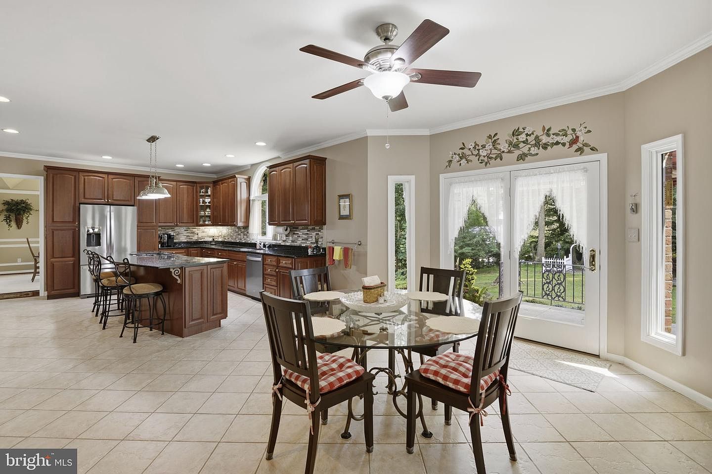 Breakfast nook with French doors opening to the rear yard